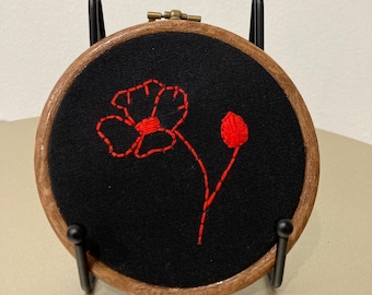 Red and black poppy hanging embroidery
