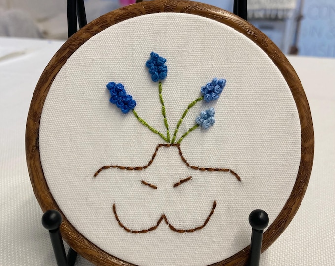 Featured listing image: Woman's torso bust with blue lilacs for head 4” hanging embroidery