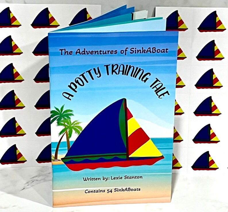 K&ouml;nnte beinhalten: Ein Kinderbuch mit dem Titel "A Potty Training Tale" mit einer Segelboot-Illustration auf dem Cover. Das Cover zeigt ein blaues Segelboot mit roten und gelben Akzenten, Palmen und dem Text "The Adventures of SinkABoat". Das Buch ist von Aufklebern umgeben.
