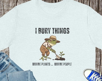 T-shirt met grafische kikker I Bury Things | Misschien planten, misschien mensen T-shirt