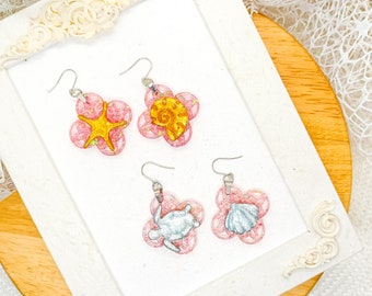 Resin and Polymer clay Earrings with seaside decorations: turtle, shells and starfish.