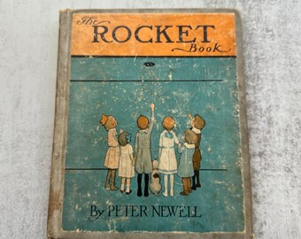 The Rocket Book de Peter Newell 1912 - Fiction illustrée à couverture rigide, livre d'histoires pour enfants