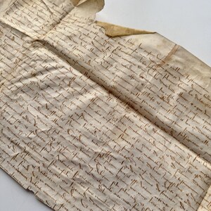 フランスから届いた羊皮紙に書かれたアンティークの手書き文書、1600