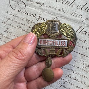 Antique French Military Humor Medal- Bon Pour Les Filles- Badge with Flame Drop