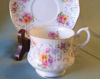 Queen's Rosina Demitasse cup & saucer with gold trim, pink and blue flowers, gray swirls, Bone China England, Excellent vintage condition