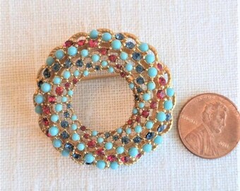 NOS Sarah Coventry Song of India goldtone brooch pin, Faux rubies, turquoise & sapphires, new old stock 1.5" round Excellent vintage conditn