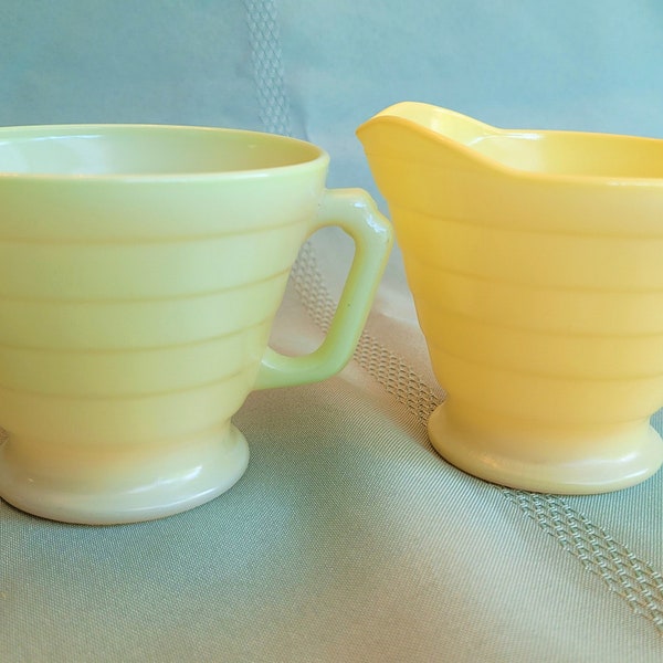 Hazel Atlas Moderntone Platonite Pastel yellow creamer & green open sugar, fired-on colors over white platonite, solid interior, unused cond