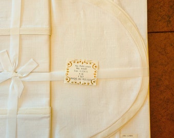 4 sets Oval Placemats & Napkins, white Irish linen with cream borders, unused, still tied to backing with ribbon Excellent vintage condition