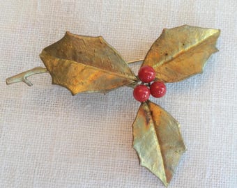 Michael Michaud Holly Leaf Sprig & Berries pin or brooch, bronze, red jade berries, marked MMA Metropolitan Museum of Art, Exc vintage cond