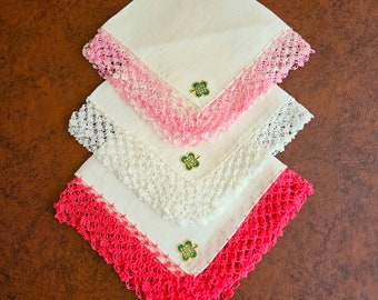 3 crochet trimmed linen hankies, pink, white, and variegated pink thread edges, ivory linen, labels, 12 to 14" unused Excellent vintage cond