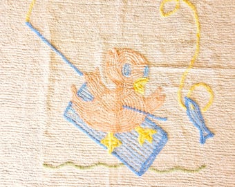 Child's Chenille Bed Coverlet, crib bedspread, pink duck fishing on a blue raft, white cotton with pink edge 39" x 56" Exc vintage condition