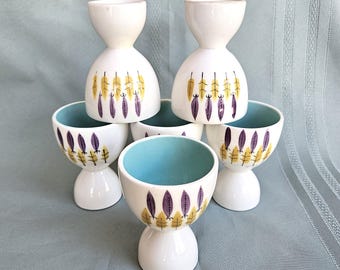 6 Double Egg Cups, Eggcups, mustard yellow & purple leaves with turquoise blue interior, unmarked, 3.75" tall, Very good to Exc vintage cond
