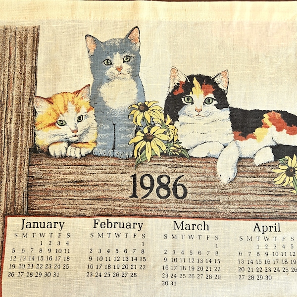 1986 Calendar Dish Towel, Kittens with Black-eyed Susans, fall colors on linen by Stevens Linens, 16" x 26" Excellent vintage condition