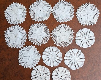13 small doilies, dollhouse linens, or tea saucer liners, hand crocheted white cotton, 3.5" rnd snowflake, & 4.75" rnd star Exc vintage cond