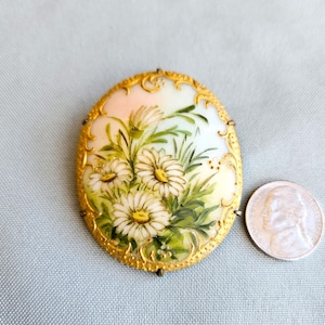 Victorian hand painted brooch, daisies on porcelain, gold painted edging on brass backing 1.75&quot; x 2 1/8&quot; replacement pin, Very Good conditn