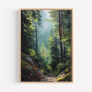 May include: A framed landscape painting depicts a forest scene with tall, green trees and a path leading into the distance. The artwork features a natural color palette with shades of green, brown, and blue, creating a serene and inviting atmosphere.
