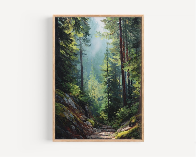 May include: A framed landscape painting depicts a forest scene with tall, green trees and a path leading into the distance. The artwork features a natural color palette with shades of green, brown, and blue, creating a serene and inviting atmosphere.