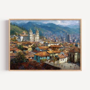 Puede incluir: Una pintura al óleo que representa una ciudad extensa en un valle bajo montañas imponentes. La escena presenta una iglesia blanca prominente con dos torres, numerosos edificios con techos de terracota y una pequeña plaza con figuras.