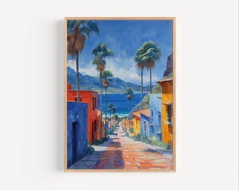 May include: A painting of a colorful street lined with palm trees and houses, leading to a view of a blue ocean and mountains in the distance.