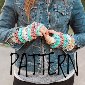 May include: A person wearing a denim jacket with colourful crocheted arm warmers. The word "PATTERN" is written in black on a grey background.