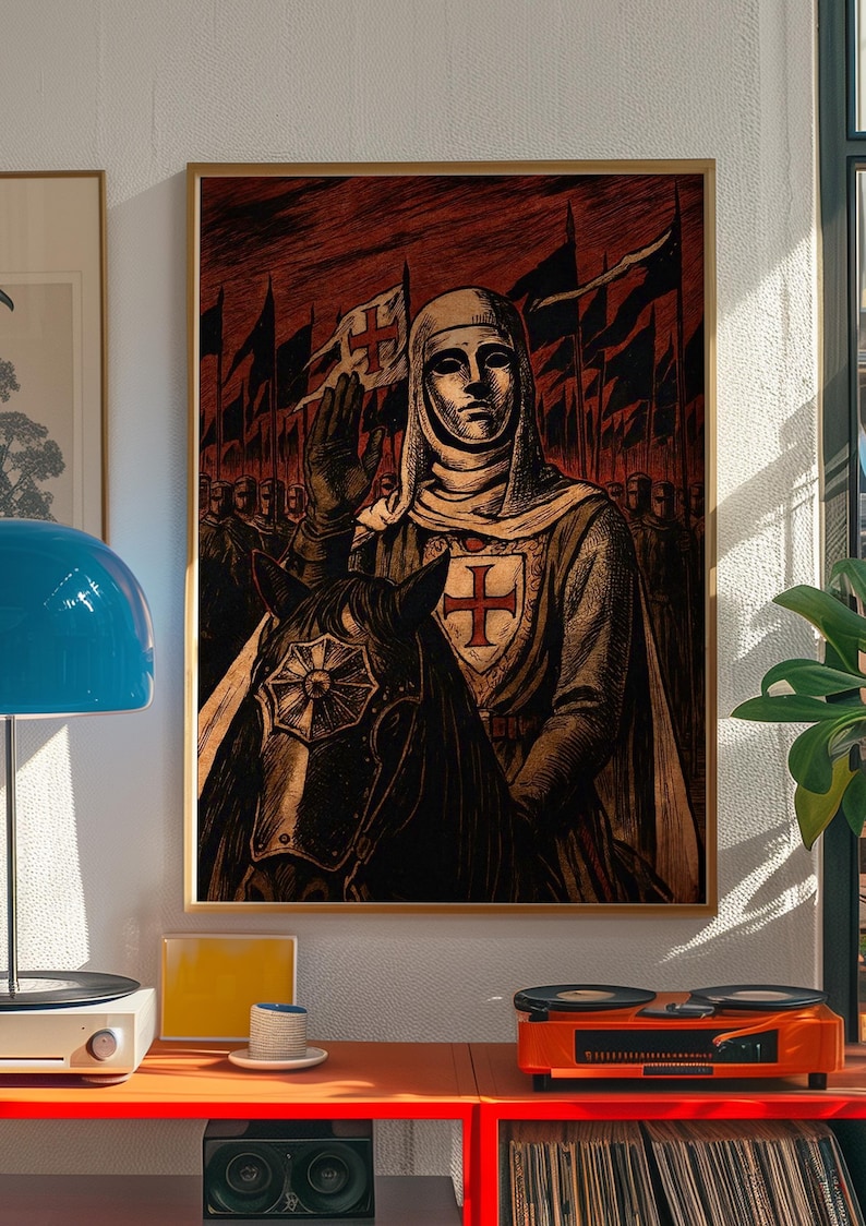 May include: Framed print of a medieval knight on horseback, raising a hand in salute. The knight wears a white hood and a shield with a red cross. The background features a red sky and black flags.
