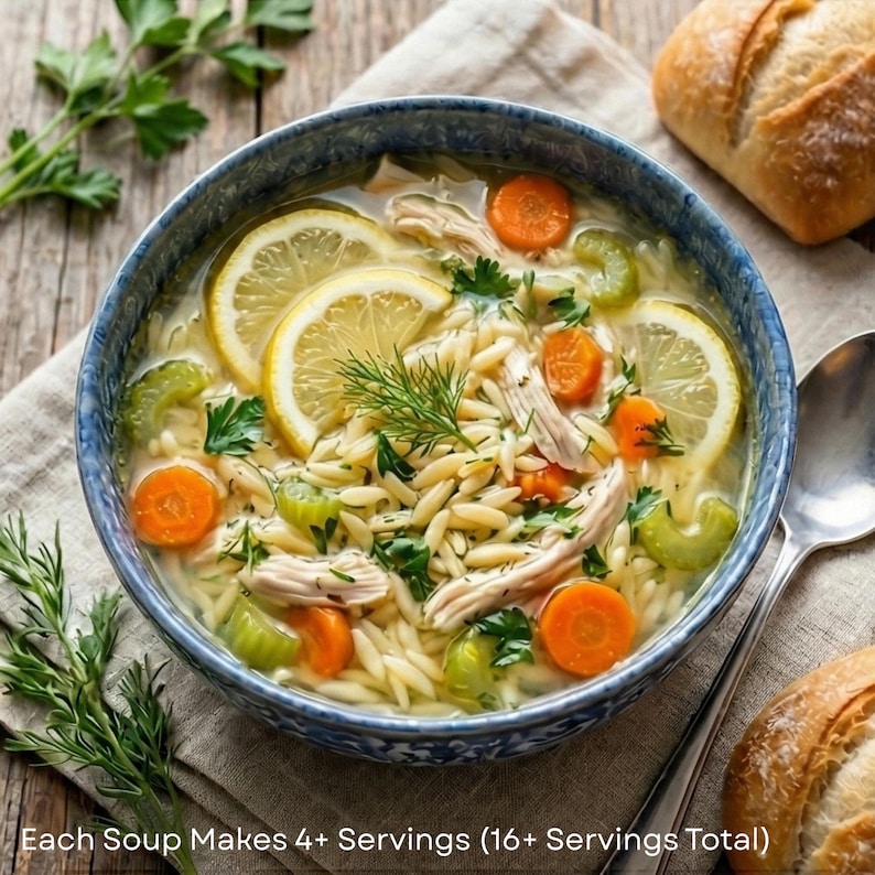 May include: A bowl of chicken orzo soup with lemon slices, carrots, and celery. The soup is in a blue and white patterned bowl, with a spoon and bread roll on the side. The text "Each Soup Makes 4+ Servings (16+ Servings Total)" is at the bottom.