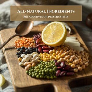 May include: A wooden cutting board displays a colorful assortment of legumes, including lentils, beans, and peas, alongside a lemon half. The text "ALL-NATURAL INGREDIENTS" and "NO ADDITIVES OR PRESERVATIVES" is displayed above the food.