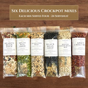 May include: Six clear plastic bags filled with dried beans and soup mixes. The bags are labeled with text including "Hearty Bean Soup", "Split Pea Soup", "Black Eyed Peas", "Black Bean Soup", "Boston Baked Beans Mix", and "Spicy Chili Mix". The text "Six Delicious Crockpot Mixes" is at the top.