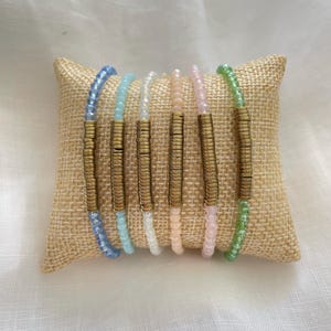 Stretch bracelets made of glass beads and natural hematite