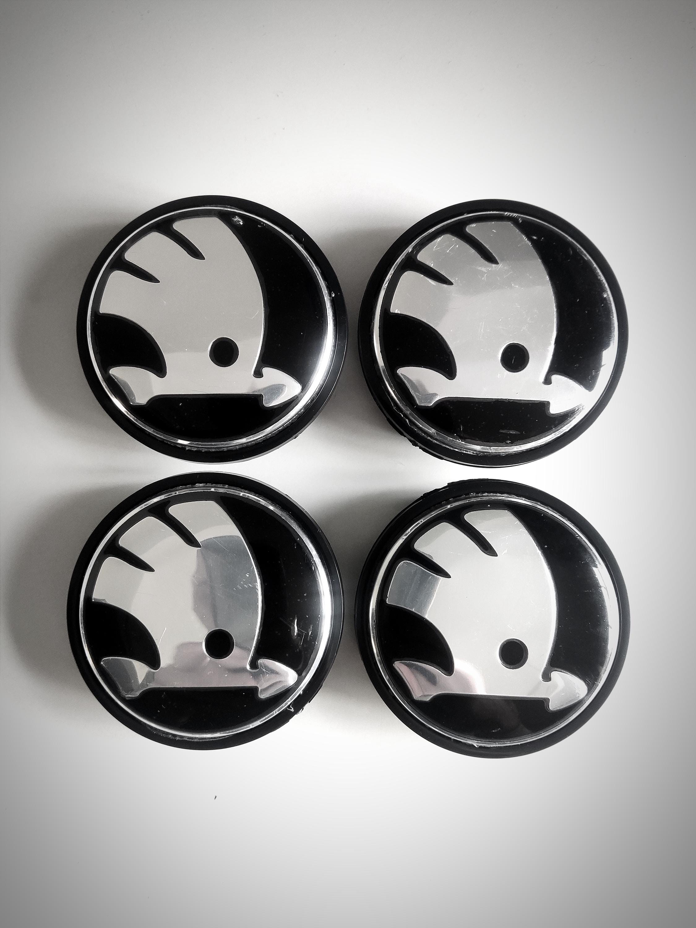 Black skoda centre caps discount