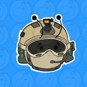 May include: A cartoon illustration of a person wearing a tan helmet with a black visor and green ear protection. The helmet has two black antennas on top.