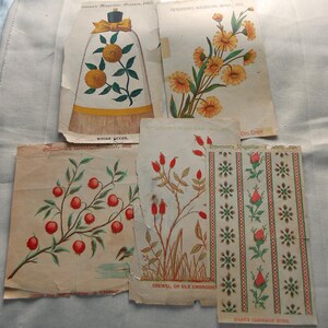 May include: A collection of vintage magazine pages featuring botanical illustrations and decorative patterns. The pages showcase images of flowers, fruit, and a whisk cover, with text including magazine titles and dates.