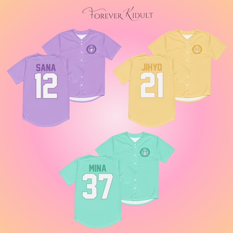 May include: Baseball jerseys in pastel colors: lavender, yellow, and mint green. Each jersey has a name and number on the back. The jerseys have a button-up front and a small logo on the chest. The text "Forever Kidult" is at the top.