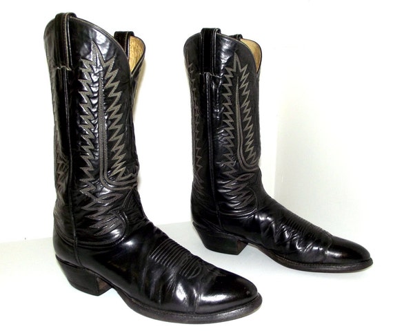 black cowboy boots with white stitching