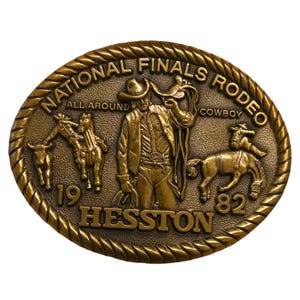 Fibbia per cintura da rodeo del 1982 Hesston NFR National Finals All Around Cowboy