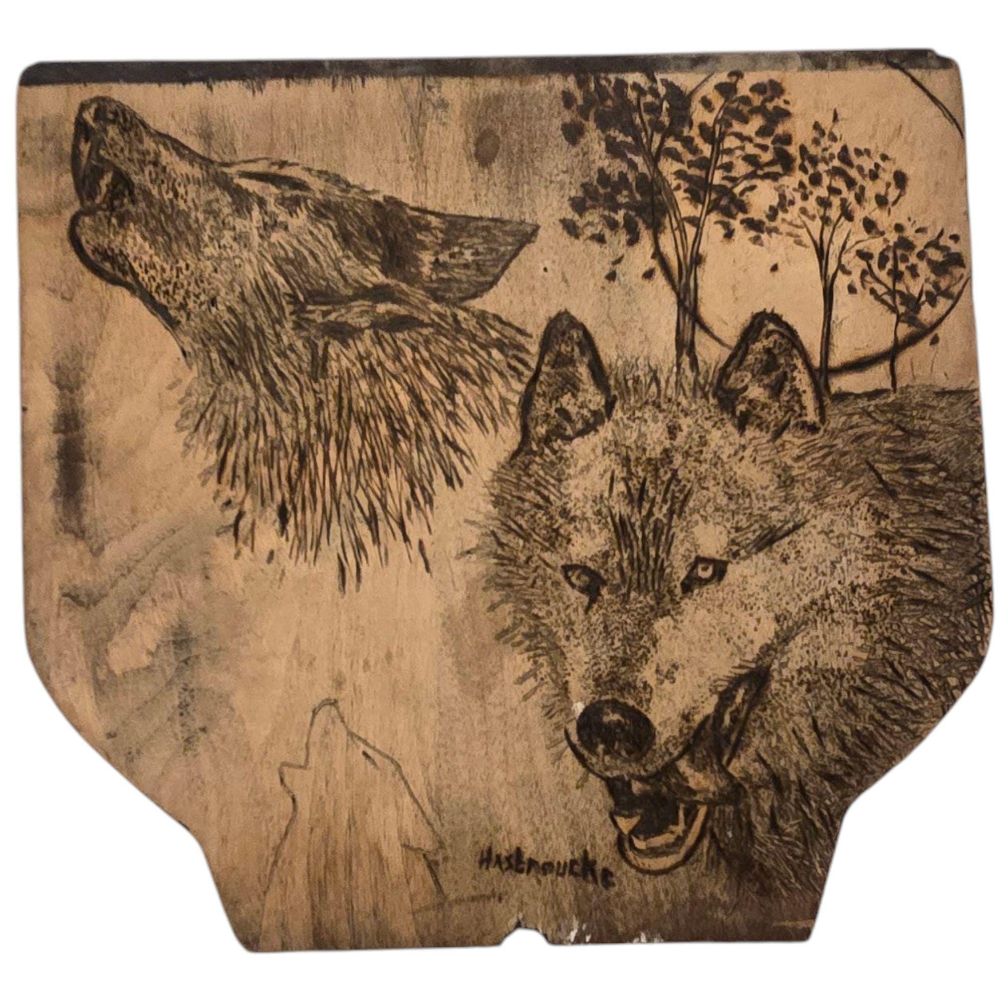 Décoration murale en bois vieilli représentant un loup rustique