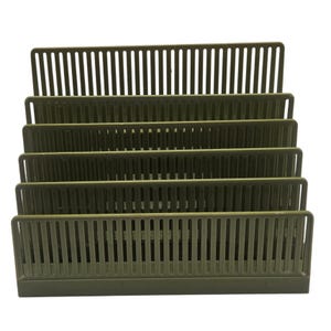 May include: An olive green plastic desk organizer featuring five tiered slots with vertical slats. The structure is designed with a stepped arrangement, allowing for the organized storage of documents, papers, or mail in a compact, upright position.
