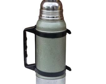 Termo vintage Stanley Aladdin de 1 cuarto de galón, de acero inoxidable con asa.