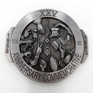 Many Hands Belt Buckle Mennonite Auction 1993 Mid Kansas Relief  25th Anniversary