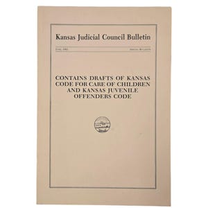 May include: A black and white image of a document titled "Kansas Judicial Council Bulletin" with the text "CONTAINS DRAFTS OF KANSAS CODE FOR CARE OF CHILDREN AND KANSAS JUVENILE OFFENDERS CODE".
