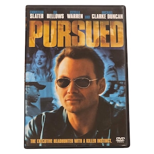 May include: DVD of the film "Pursued" starring Christian Slater, Gil Bellows, Estella Warren, and Michael Clarke Duncan. The cover is predominantly blue and yellow, with the title in large, bold lettering. The tagline reads "The Executive Headhunter With A Killer Instinct."