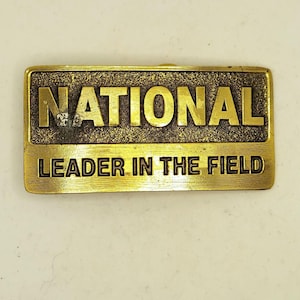 National Leader In The Field Belt Buckle Vintage Armco Country Western