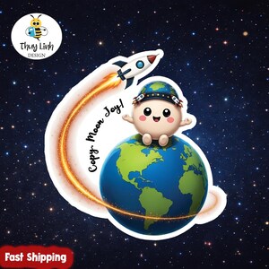 Adesivo inspirado no projeto Artemis II da NASA, da Moon Joy. Ideal para presentear amantes do espaço.