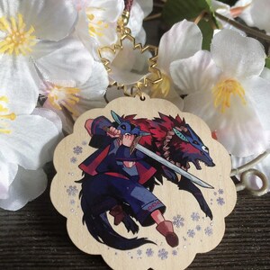 May include: A wooden charm featuring a character with a sword and a wolf. The charm is decorated with snowflakes and has a gold snowflake charm attached to it.