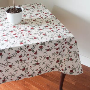 Red floral square cotton linen mahjong table cloth, perfect for game nights, card tables, and holiday entertaining. This washable, reusable table cover doubles as a festive Christmas table cloth or kitchen table topper. Inspired by William Morris-style prints, it adds timeless elegance while protecting your surfaces. Ideal for poker, bridge, or casual family games, this versatile table linen elevates both dining and play.