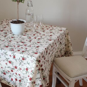 Red floral square card tablecloth made from cotton-linen blend, perfect for mahjong, bridge, and poker nights. Washable, reusable, and designed for game tables or festive holiday use. Doubles as a Christmas table cloth, kitchen table cover, or rehearsal dinner table topper. Featuring William Morris-style prints, this game table cloth combines timeless design with everyday practicality. Fits a table size upto 35" x35"