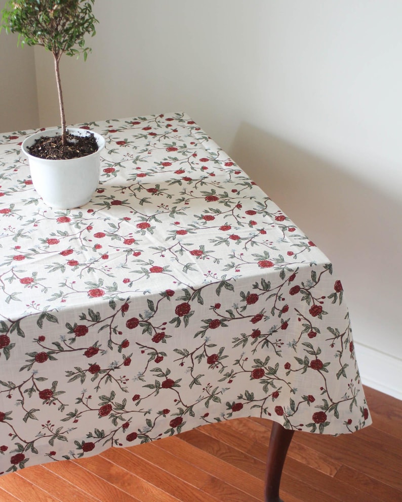 Red floral square cotton linen mahjong table cloth, perfect for game nights, card tables, and holiday entertaining. This washable, reusable table cover doubles as a festive Christmas table cloth or kitchen table topper. Inspired by William Morris-style prints, it adds timeless elegance while protecting your surfaces. Ideal for poker, bridge, or casual family games, this versatile table linen elevates both dining and play.