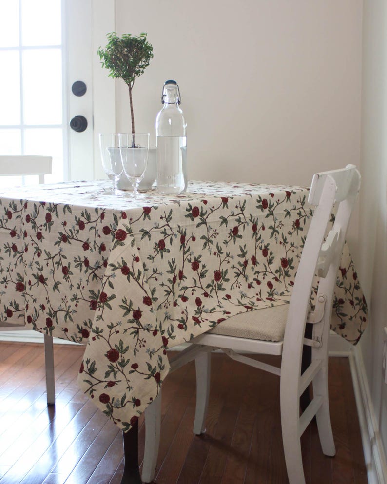 Square red floral mahjong table cloth in cotton linen, designed for card games, bridge, and holiday gatherings. Washable and reusable, this durable table cover protects your table while adding charm. Use as a Christmas table cloth, rehearsal dinner linen, or game table cover. Perfect for poker nights, casual family meals, or festive entertaining. Inspired by William Morris prints, this card tablecloth blends practicality with timeless style for every season.