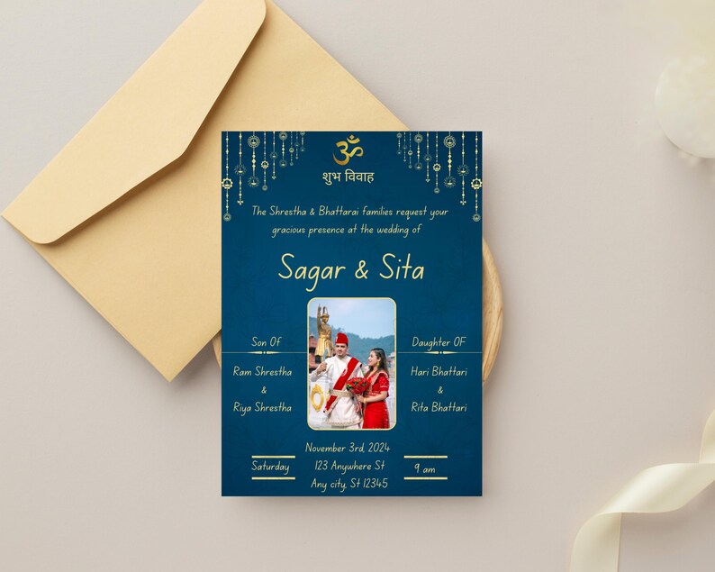 May include: A blue wedding invitation with gold accents. The invitation features a photo of the couple, the text "Sagar & Sita", and the date and time of the wedding. The invitation also includes the names of the bride and groom's parents.