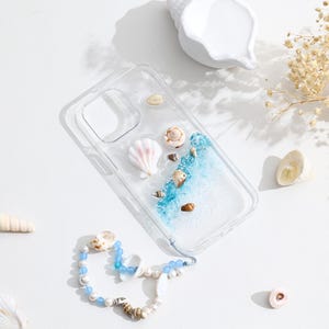 Handgemaakt strandtelefoonhoesje met oceaangolfontwerp – doorzichtig harshoesje met echte schelpen, 3D blauwe zee-effect, iPhone zomercover